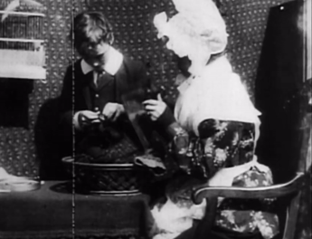 Grandma's Reading Glass, G.A. Smith (1900)